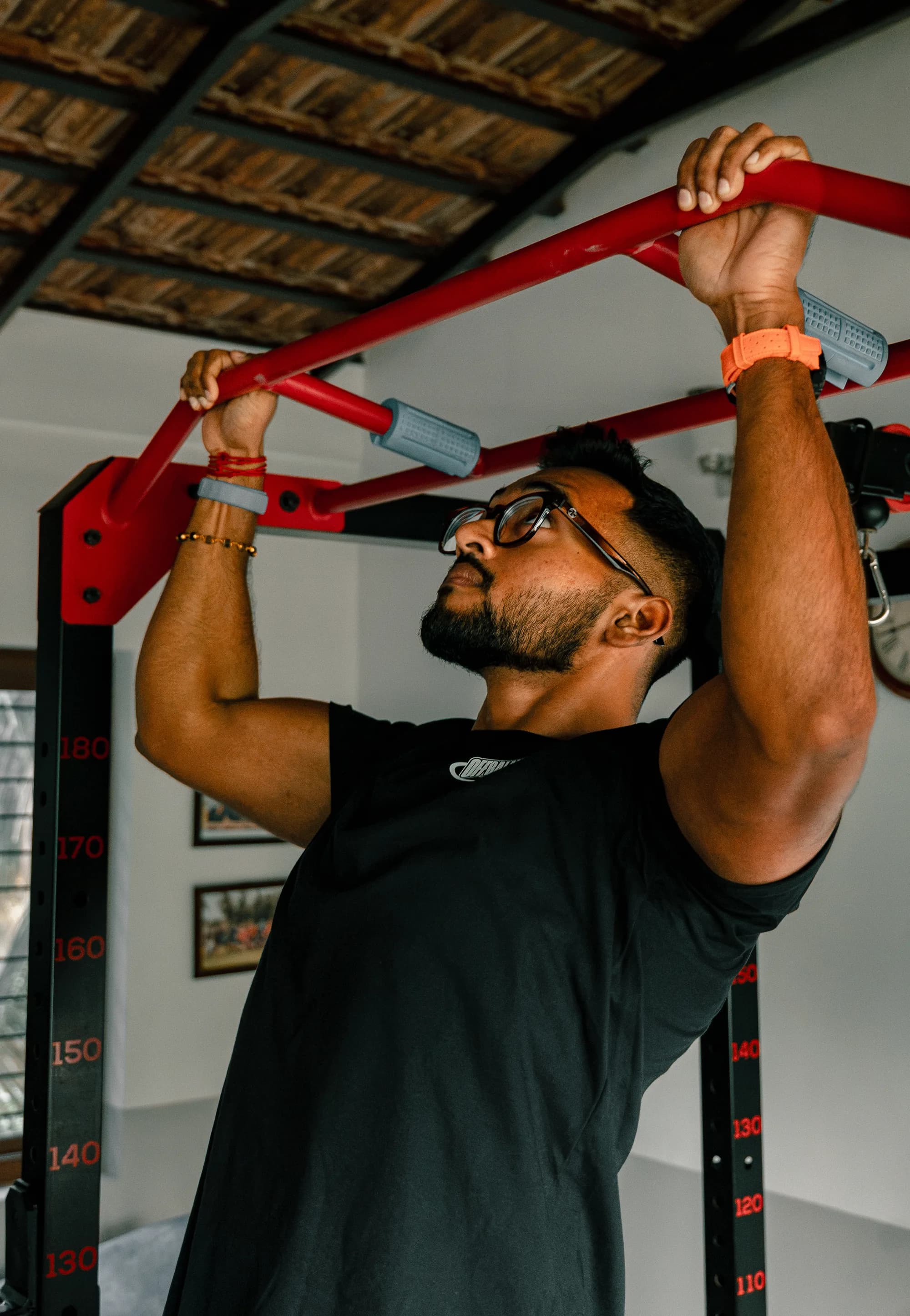 Achuthan training on the pull-up rig