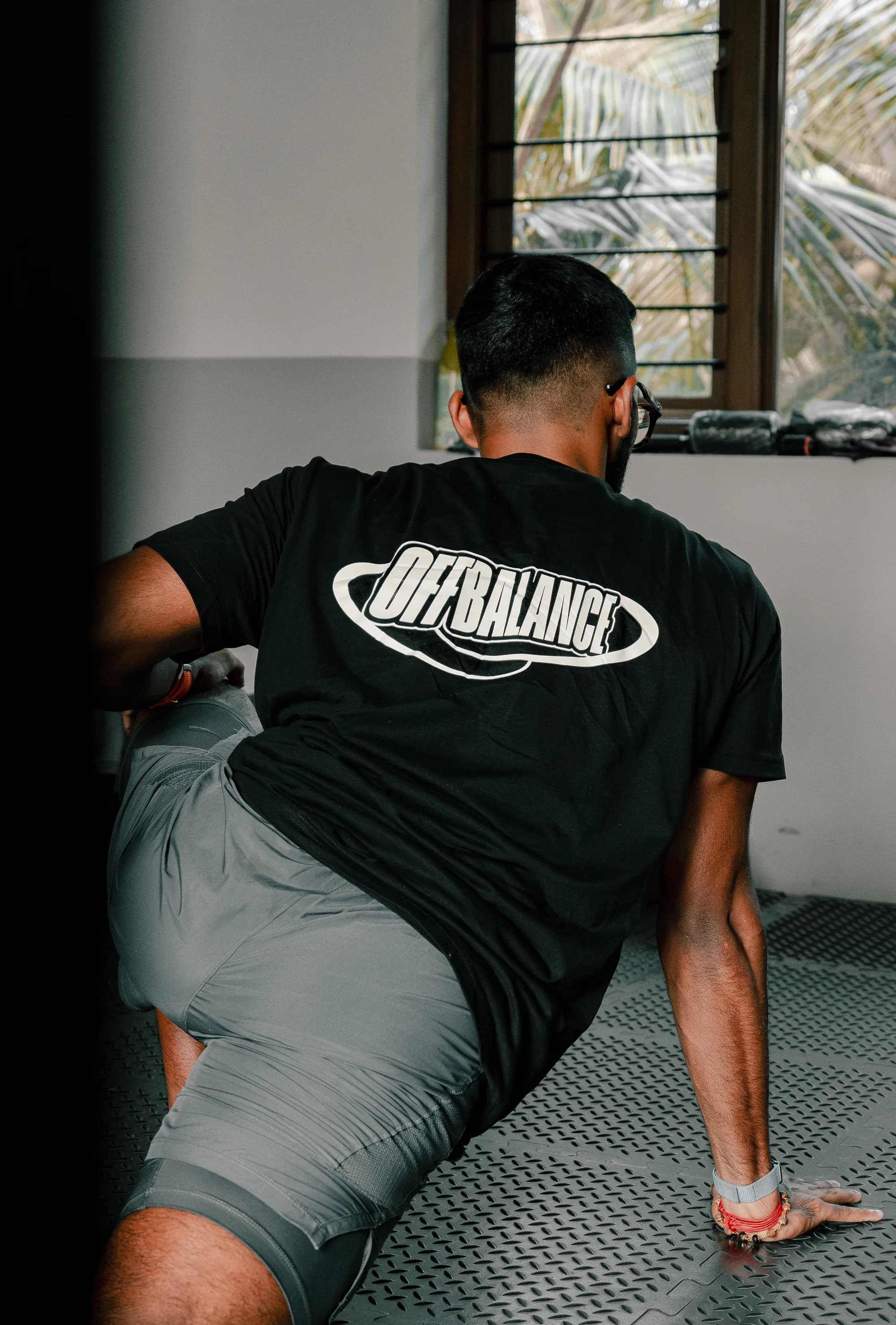 Achuthan training in an Off Balance shirt