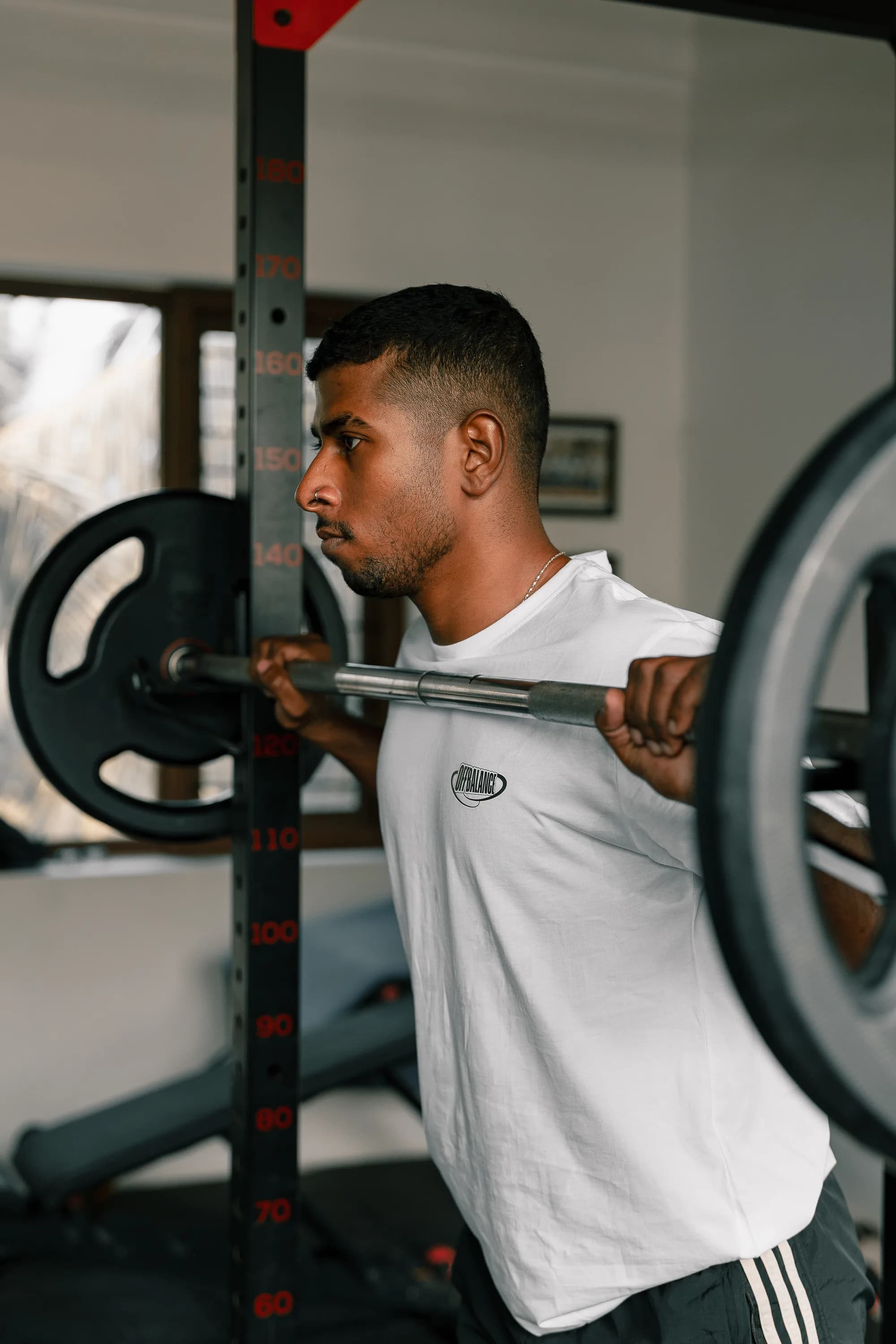 Off Balance fitness coach CJ training with a barbell — strength training in Kerala