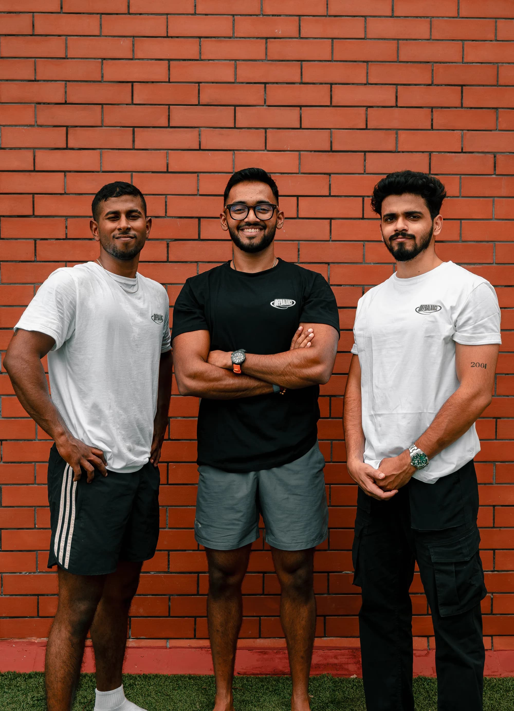 CJ, Kurien and Achuthan standing together in Off Balance shirts